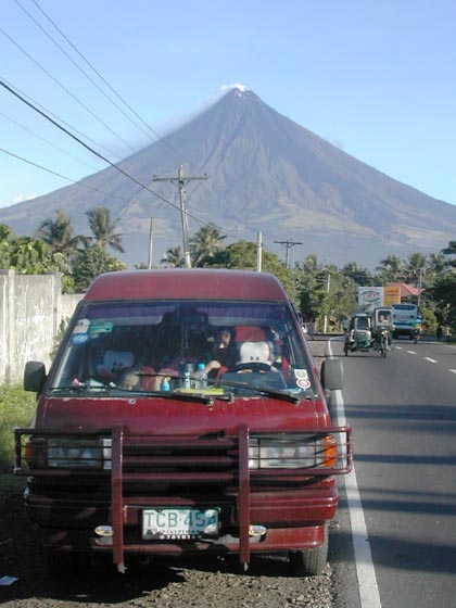 Mayon Volcano seen the side mirror.